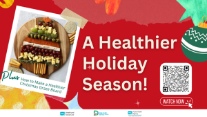 A festive graphic with a red background and holiday-themed decorations. On the left, there is a photo of a wooden board arranged with a healthy Christmas graze selection, including grapes, cheese cubes, breadsticks, crackers, and vegetables, styled in a tree shape. Text on the image reads: “A Healthier Holiday Season!” and “Plus: How to Make a Healthier Christmas Graze Board.” There is a QR code and a red button labeled “Watch Now.” Logos for Health and Social Care and the Public Health Agency are at the bottom